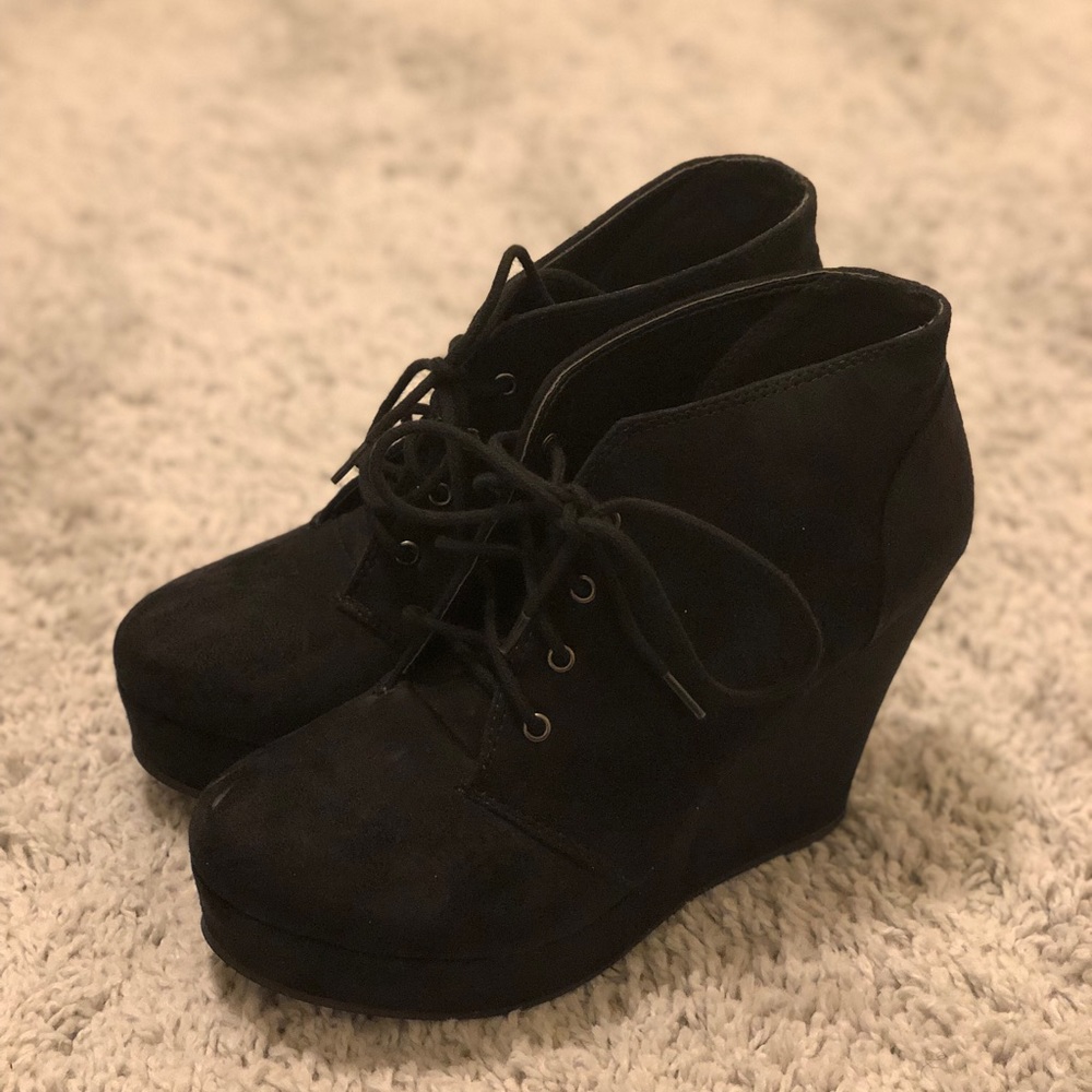 Black wedge booties